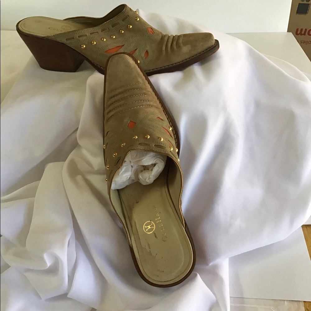 Cole Han slip on mule. Cowboy look.